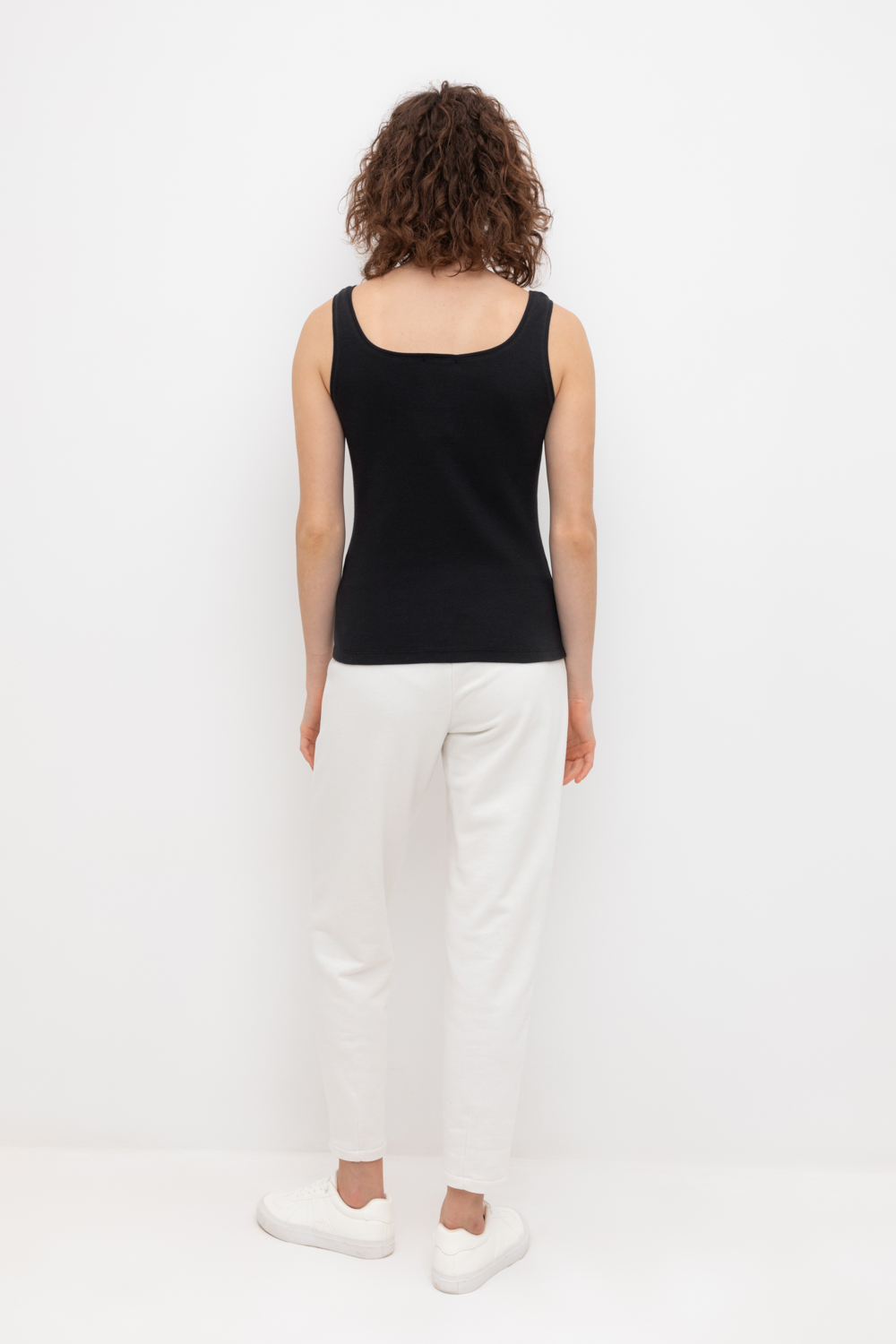 картинка Зауженные теплые брюки из футера трехнитки от магазина Одежда+